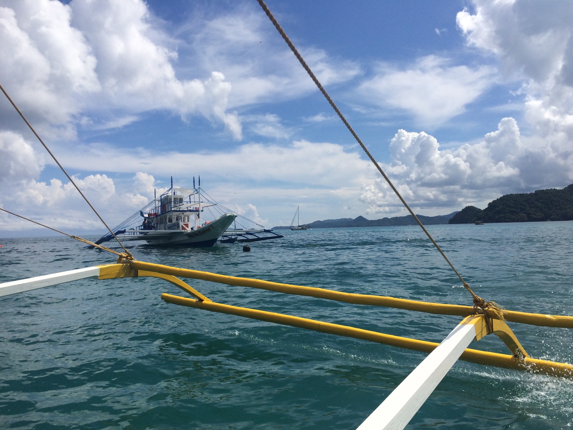 This larger boat hails us and we pass Port to Starboard while under motor.