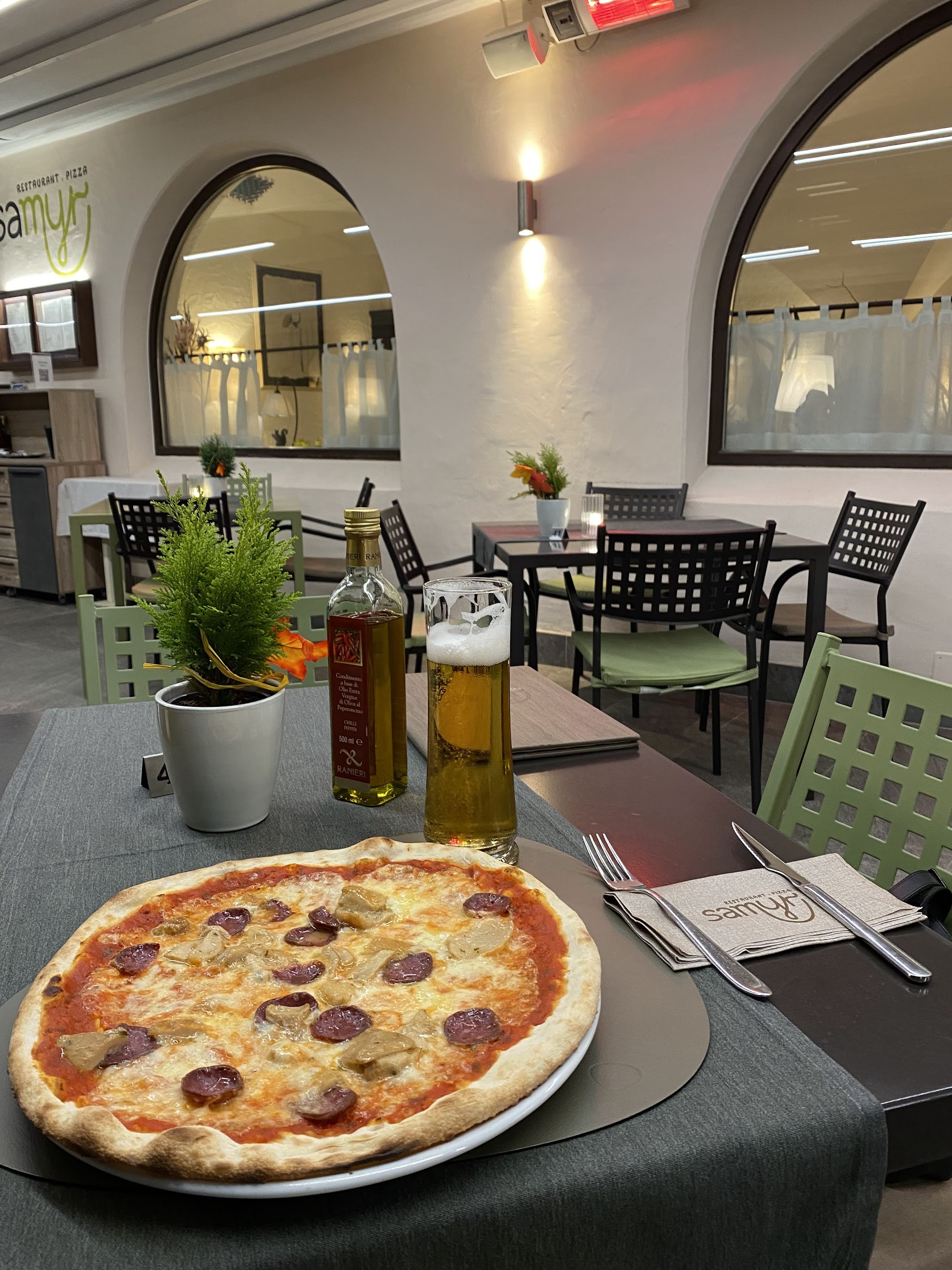 After 76 km of cycling having a good pizza and a cold beer feels like Heaven