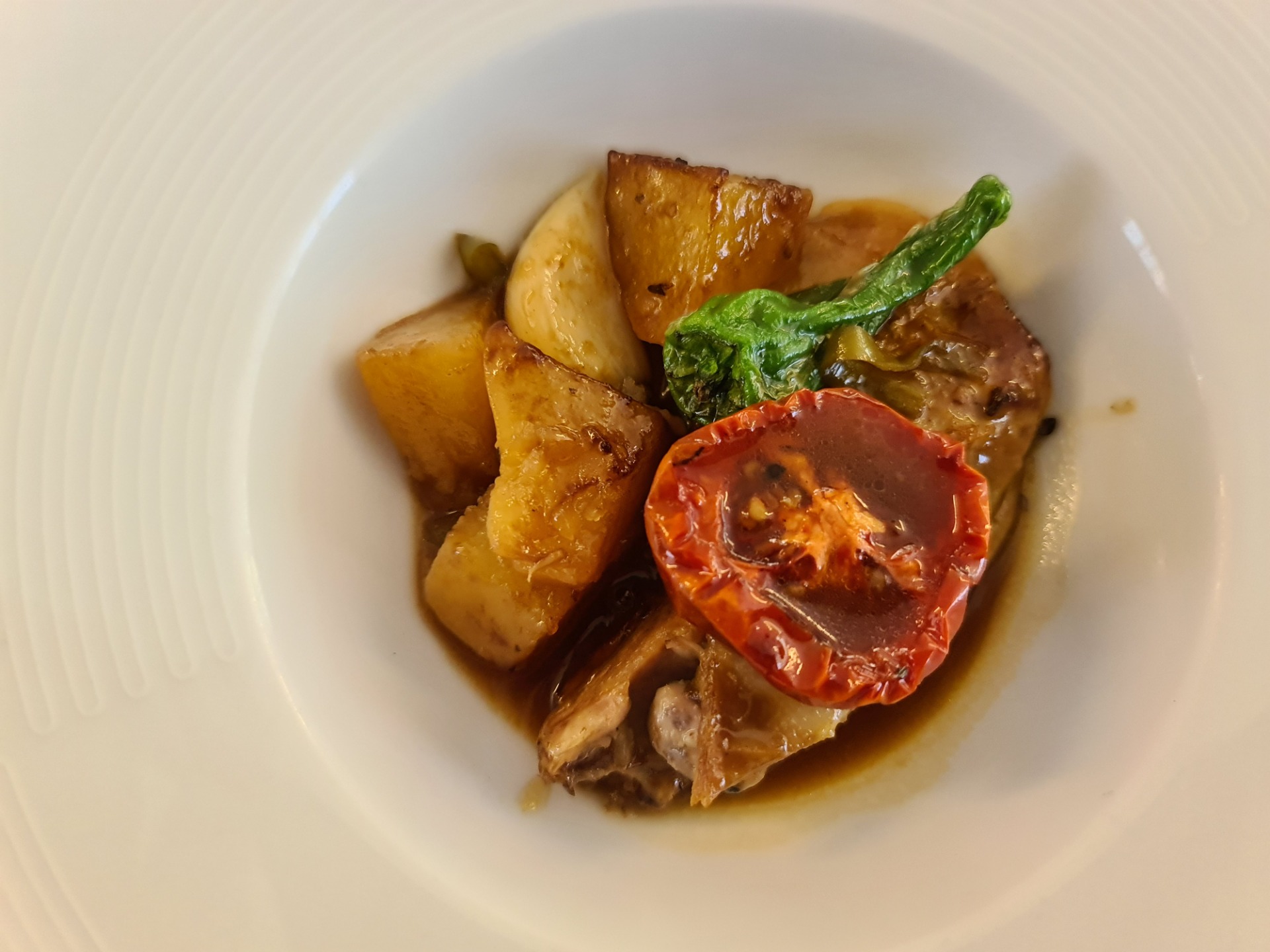 Confit in oil suckling goat shoulder in a stew pot - Second main dish (2).