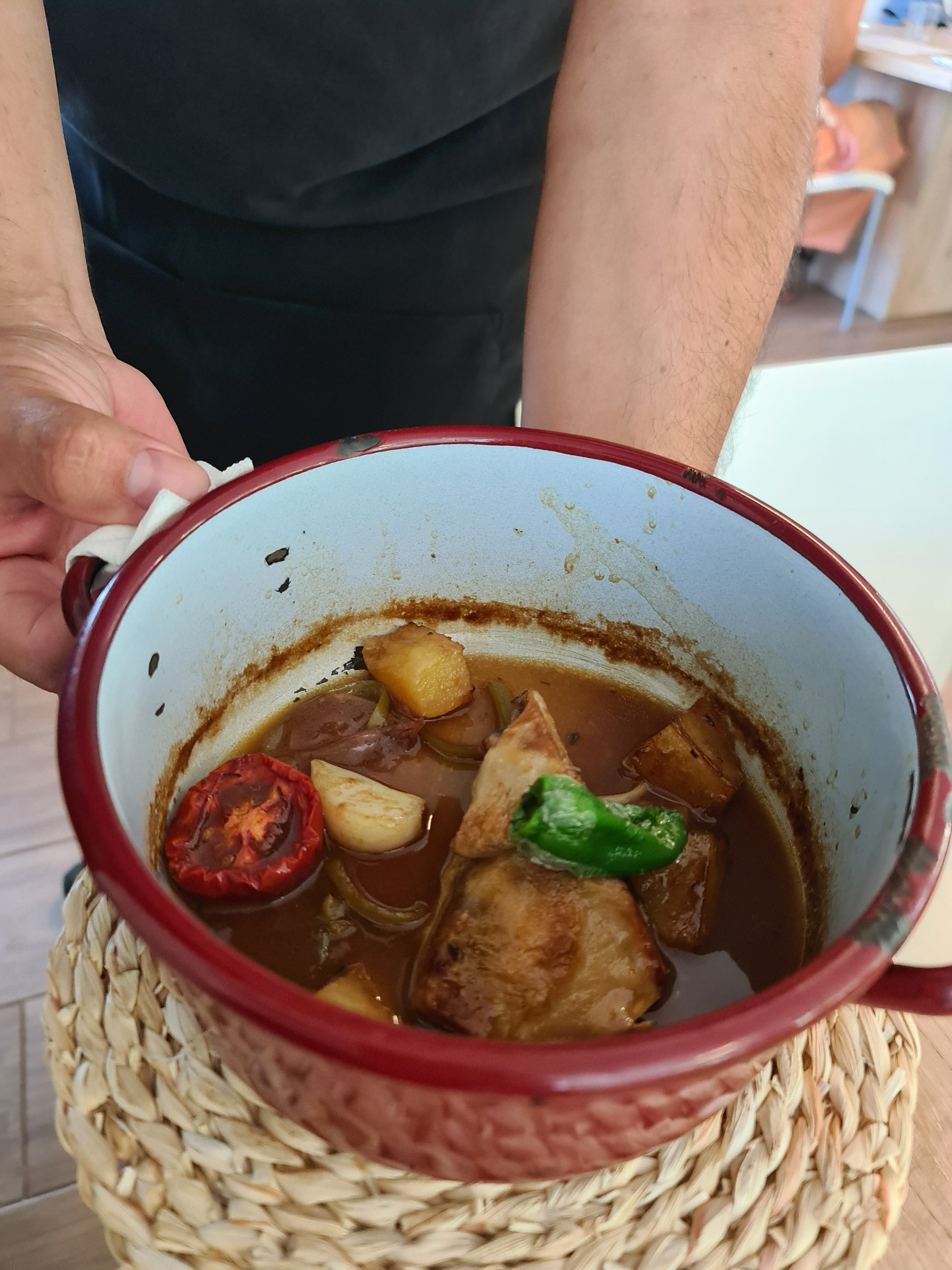 Confit in oil suckling goat shoulder in a stew pot - Second main dish (1).