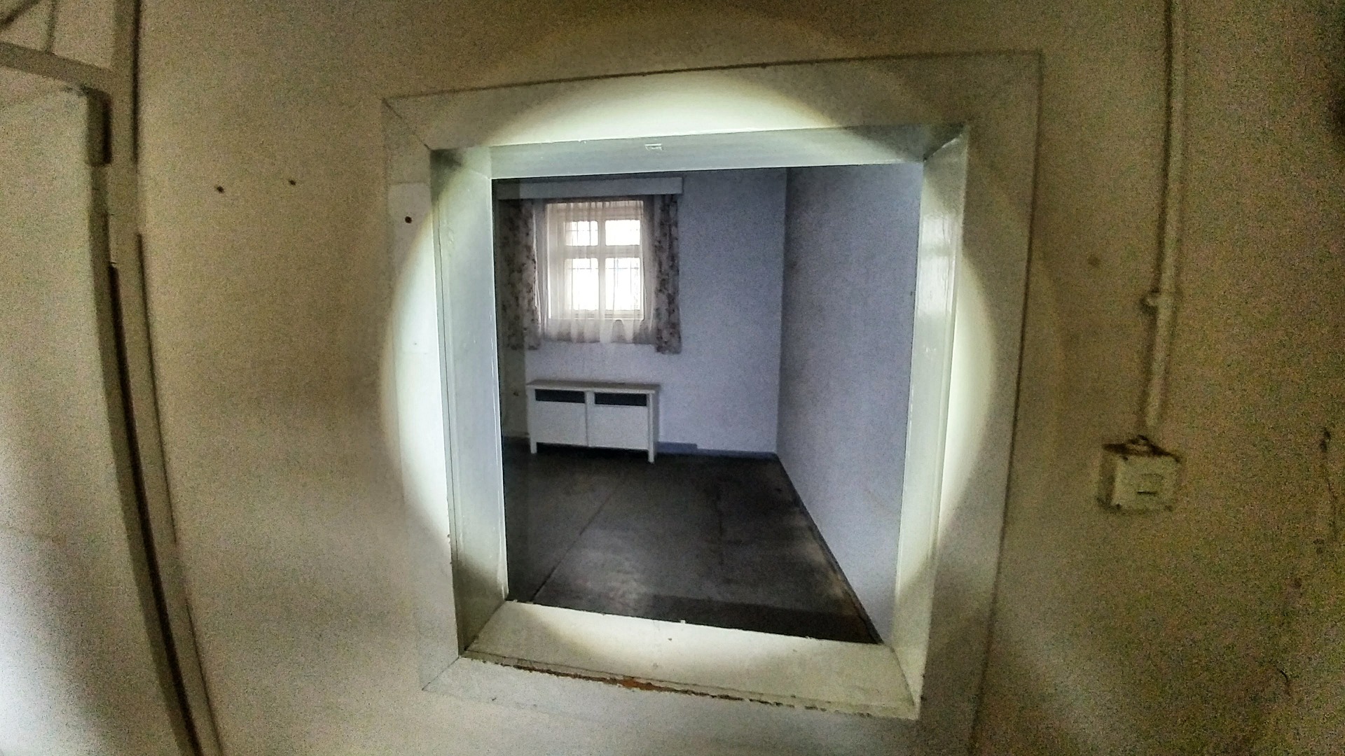 A room with an inside window