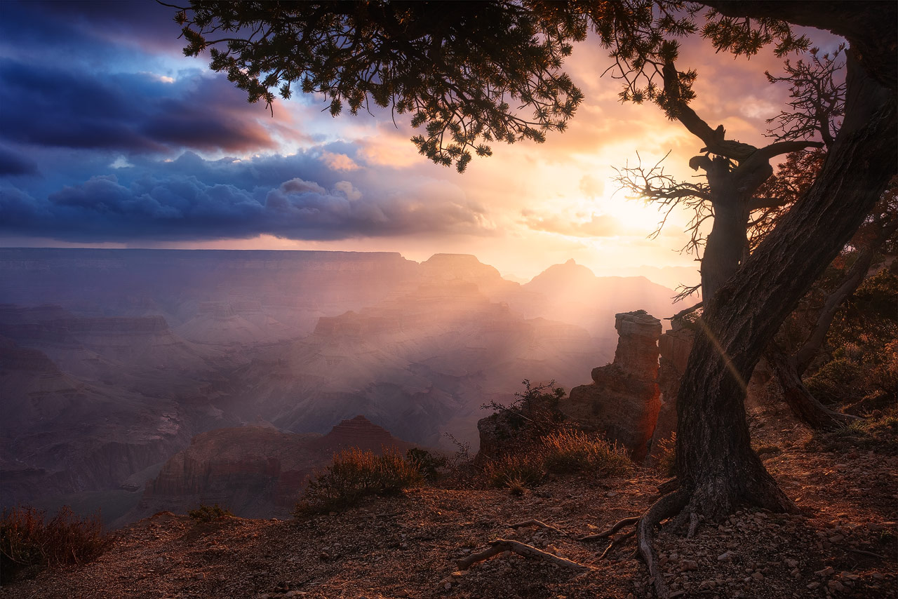 The sun bursts through the clouds at Yaki Point.