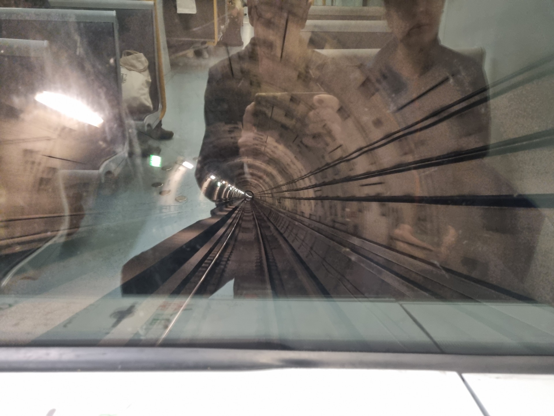 The driverless metro train started above ground at the airport but soon went under ground in the city centre. Sitting right at the front was a great view.