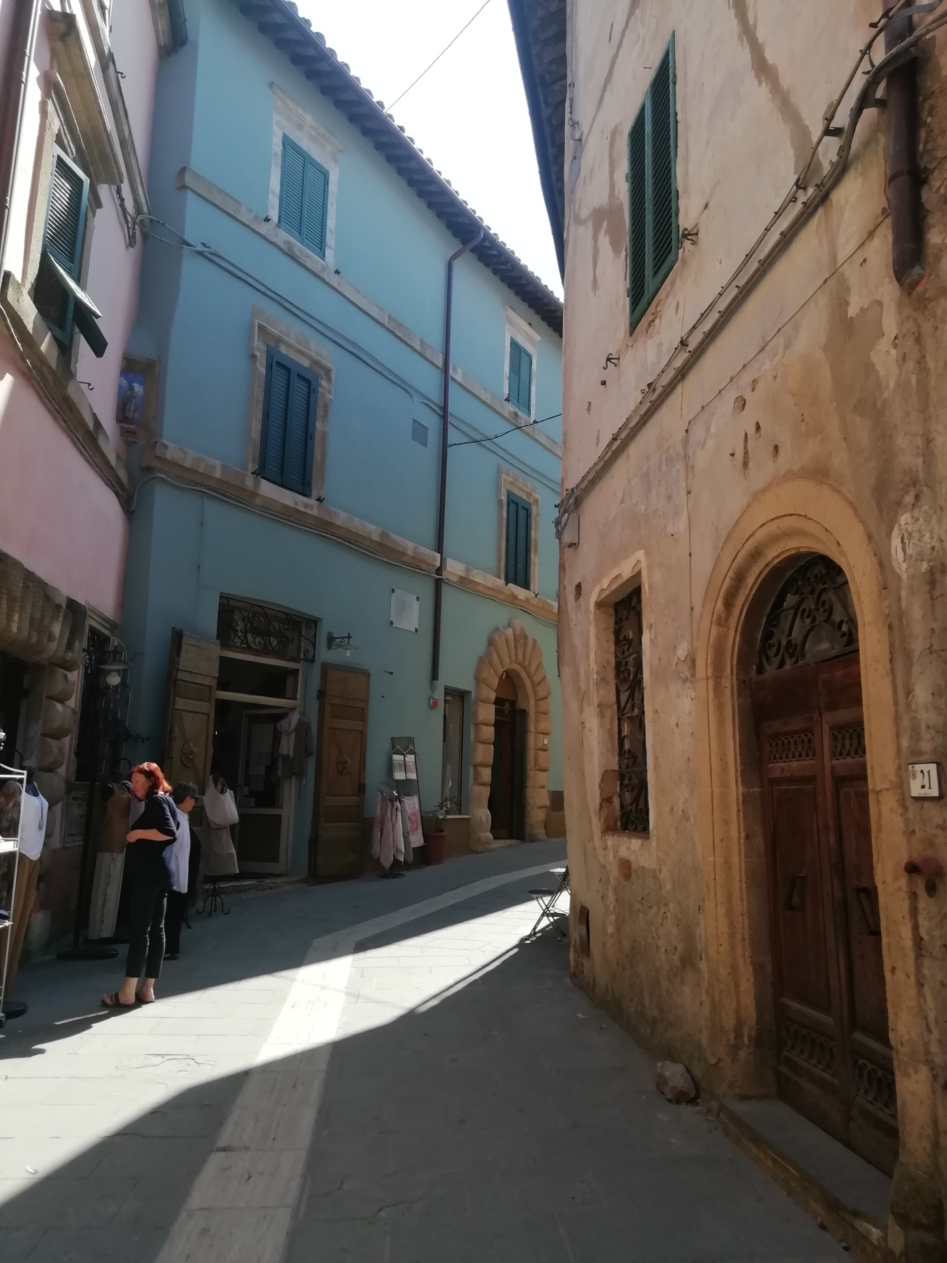 The street with the shops.