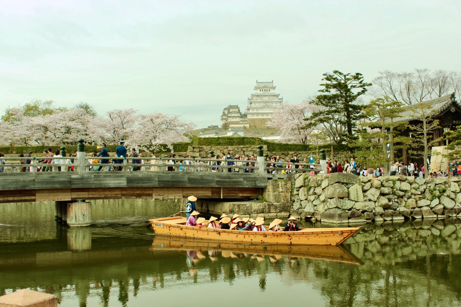 Ride a boat around the castle moat