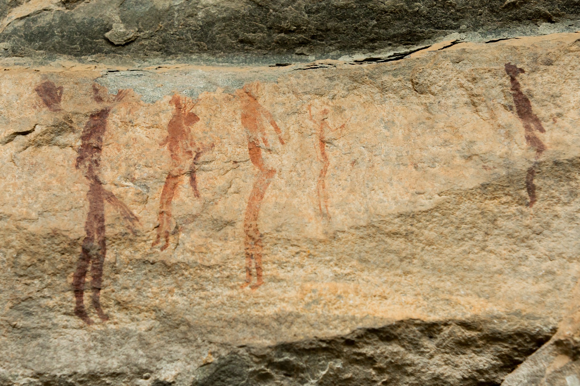 San people possibly preparing to go out hunting or in a tribal ritual.