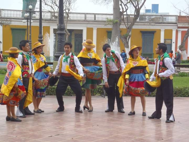 Young people with typical costumes