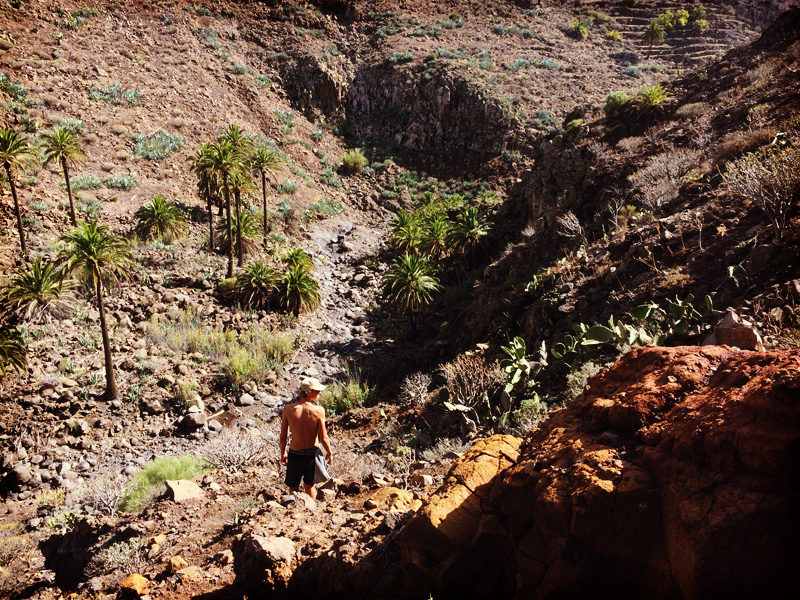 Jumping down the boulders in the hike down. Valle Gran Rey canyon
